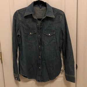 Western style denim shirt with pearl colored snaps